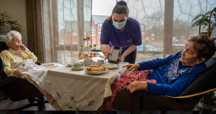 Residents enjoying an afternoon tea as part of their meaningful activities