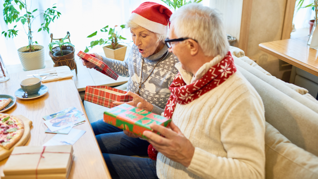 christmas hamper for grandparents: Older adults opening their gifts